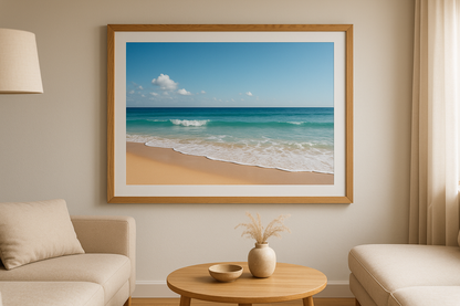 A0 print of beach framed in oak in living room