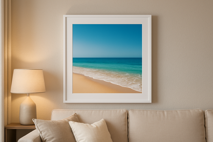square white framed print of beach in living room